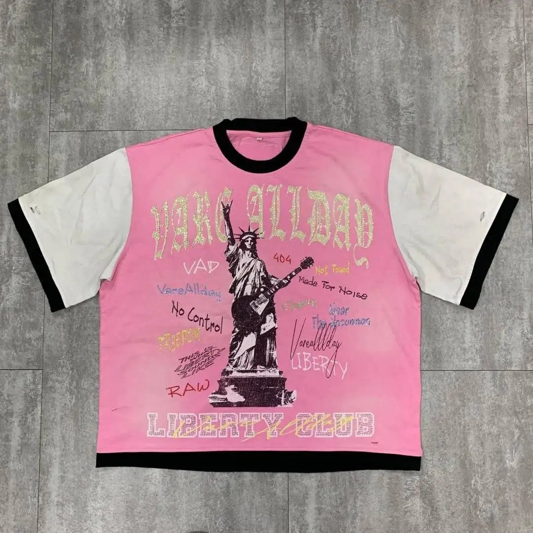 Flash — T-shirt Oversized com Grafismo e Brilhantes