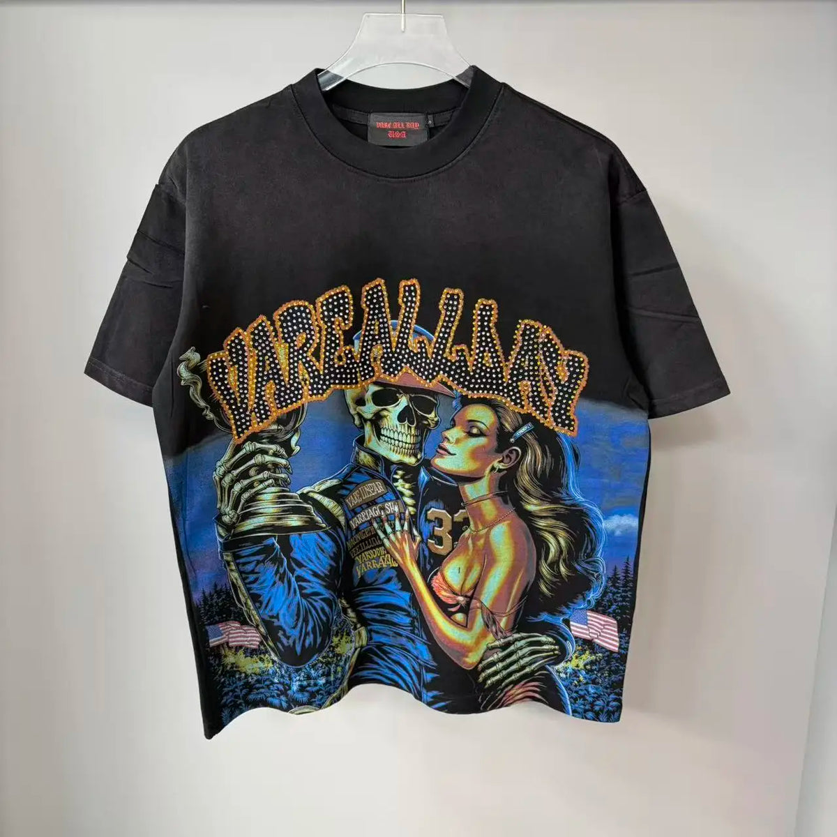 Flash — T-shirt Oversized com Grafismo e Brilhantes
